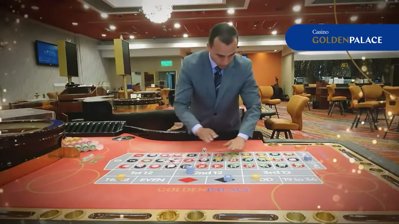 Crupier junto al tapete de ruleta con las apuestas externas marcadas